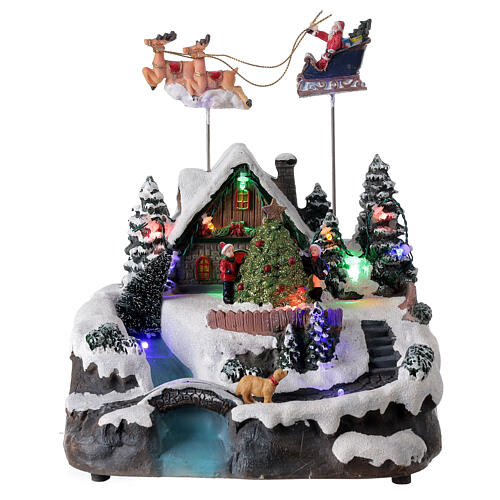 villaggio babbo natale luci musica torrente 25x20x20 cm