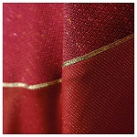 casula experience rossa tessuti misti linee dorate atelier sirio