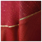 casula experience rossa tessuti misti linee dorate atelier sirio